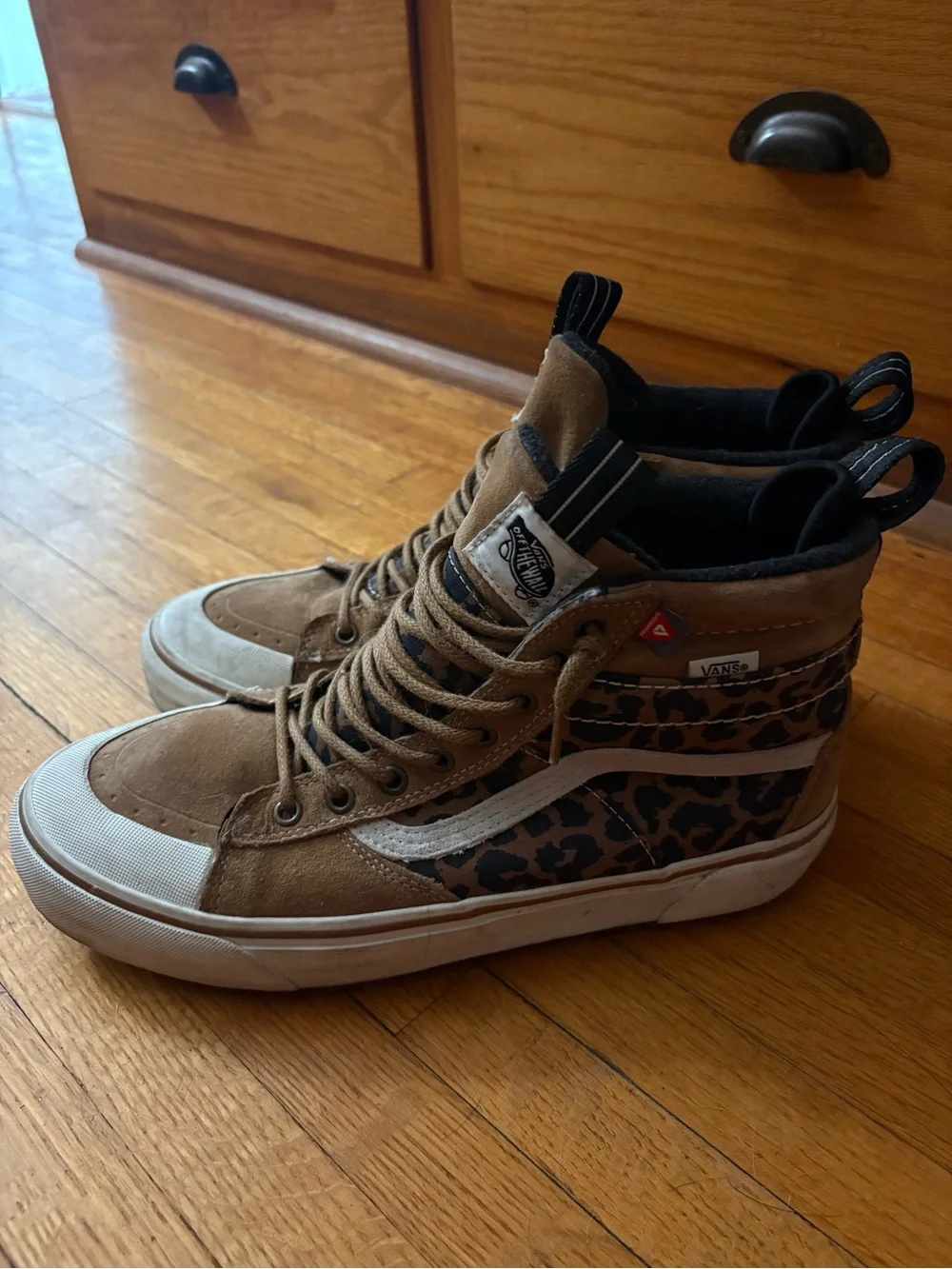 Vans Women's High-Top Winter Boots in Brown and White or a men’s 9.5